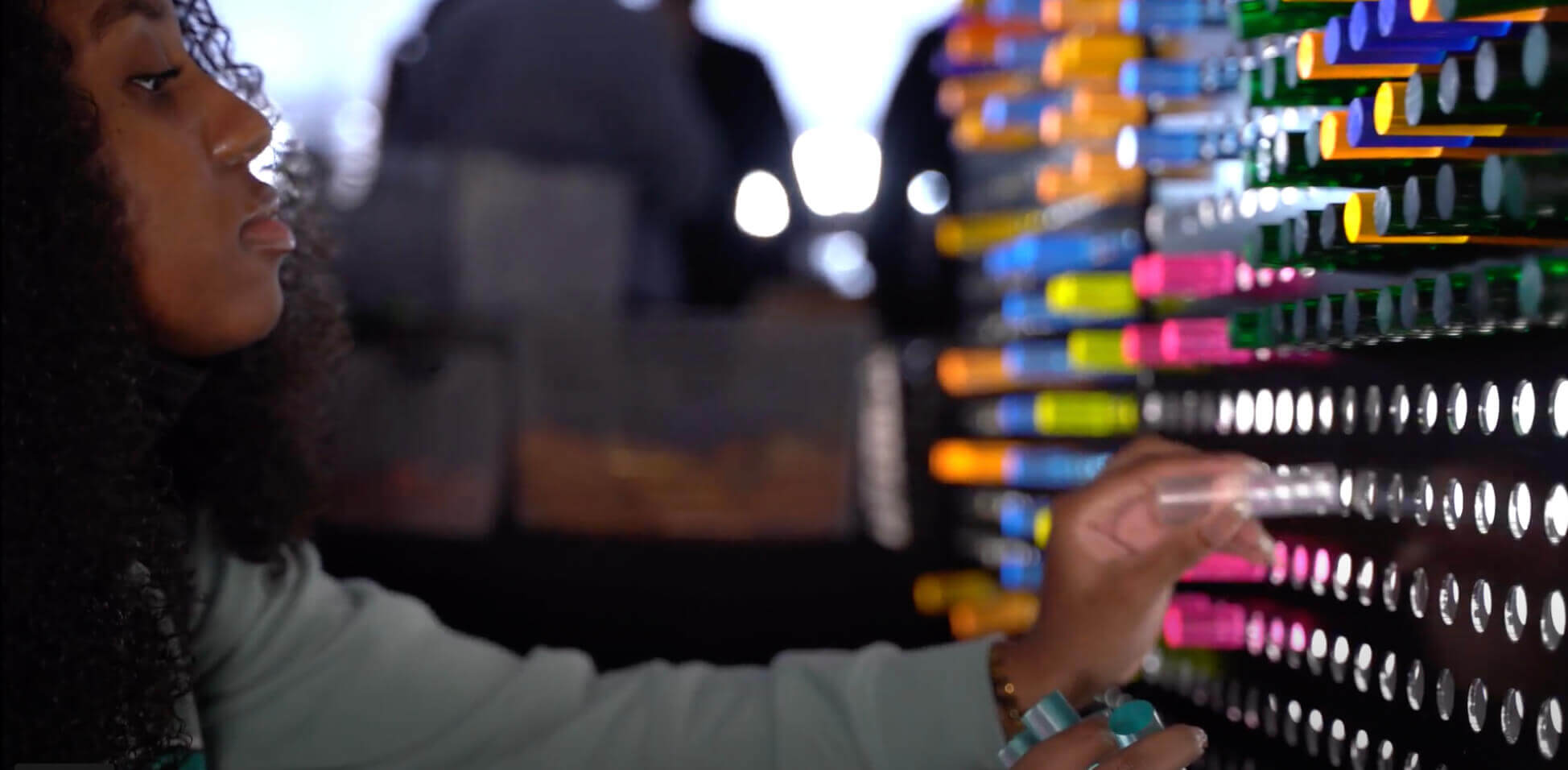 Lite Brite Close Up - Woman putting back the product on the shelf